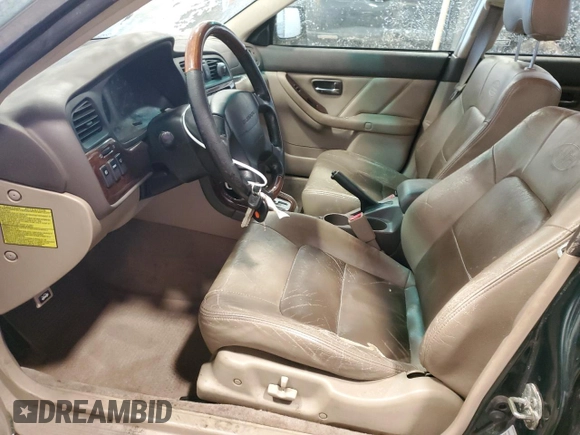 2002 Subaru Legacy Outback L.L. Bean with VIN 4S3BH806X27632535, listed as a Copart auction lot 85776294 with 298,022 mi miles and Salvage title. Bid and sale history available at DreamBid. Image 7.