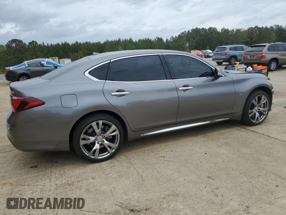 2015 Infiniti Q70 z VIN JN1BY1PR6FM831034, wystawiony jako Copart lot #51889835 z przebiegiem 128 220 mil mil oraz Szkoda całkowita • Salvage title. Historia ofert i sprzedaży dostępna na DreamBid. Obrazek 3.