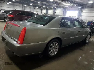 2011 Cadillac DTS Premium Collection z VIN 1G6KH5E68BU143689, wystawiony jako Copart lot #51861855 z przebiegiem 124 522 mil mil oraz Szkoda całkowita • Salvage title. Historia ofert i sprzedaży dostępna na DreamBid. Obrazek 3.