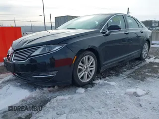 2016 Lincoln MKZ z VIN 3LN6L2JK8GR602793, wystawiony jako IAAI lot #41744058 z przebiegiem 105 234 mil mil oraz . Historia ofert i sprzedaży dostępna na DreamBid. Obrazek 17.