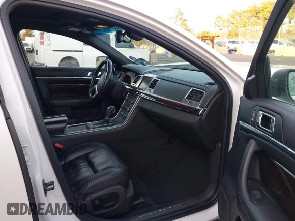 2010 Lincoln MKS with VIN 1LNHL9ER9AG611753, listed as a IAAI auction lot 41402237 with 143,859 mi miles. Bid and sale history available at carsss.com. Image 5.