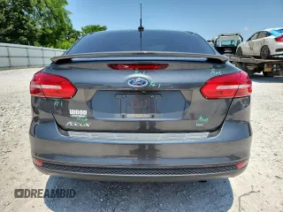 2018 Ford Focus SE with VIN 1FADP3F25JL331038, listed as a Copart auction lot 60235395 with 37,038 mi miles and Salvage title. Bid and sale history available at DreamBid. Image 6.