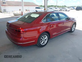 2017 Volkswagen Passat S z VIN 1VWAT7A38HC056207, wystawiony jako IAAI lot #42586003 z przebiegiem 114 329 mil mil oraz . Historia ofert i sprzedaży dostępna na DreamBid. Obrazek 4.