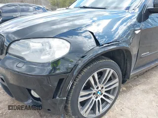2013 BMW X5 xDrive35i z VIN 5UXZV4C51D0E11079, wystawiony jako IAAI lot #41875305 z przebiegiem 161 861 mil mil oraz . Historia ofert i sprzedaży dostępna na DreamBid. Obrazek 6.