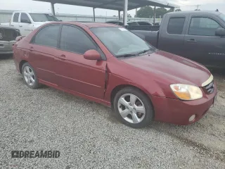 2009 Kia Spectra EX with VIN KNAFE221995022444, listed as a Copart auction lot 70231984 with 257,120 mi miles and Clean Title. Bid and sale history available at carsss.com. Image 4.