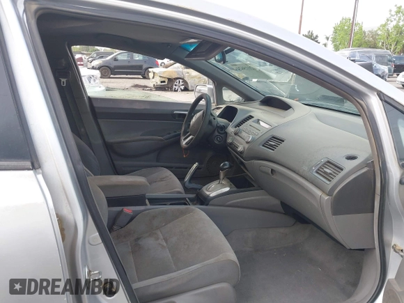 2006 Honda Civic LX with VIN 1HGFA165X6L144003, listed as a IAAI auction lot 42115624 with 310,261 mi miles and . Bid and sale history available at DreamBid. Image 5.