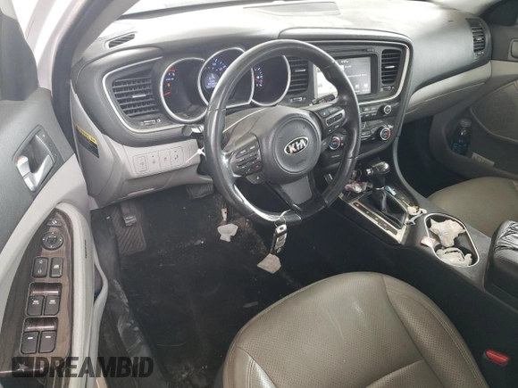 2015 Kia Optima EX z VIN 5XXGN4A75FG452374, wystawiony jako Copart lot #59928725 z przebiegiem 162 831 mil mil oraz Szkoda całkowita • Salvage title. Historia ofert i sprzedaży dostępna na DreamBid. Obrazek 8.
