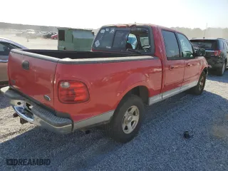 2001 Ford F-150 SuperCrew XLT with VIN 1FTRW07W91KE40272, listed as a Copart auction lot 75063324 with 218,183 mi miles and Salvage Title. Bid and sale history available at carsss.com. Image 4.