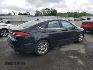 2018 Ford Fusion SE z VIN 3FA6P0LU8JR264630, wystawiony jako Copart lot #57036345 z przebiegiem 234 757 mil mil oraz Szkoda całkowita • Salvage title. Historia ofert i sprzedaży dostępna na DreamBid. Obrazek 3.