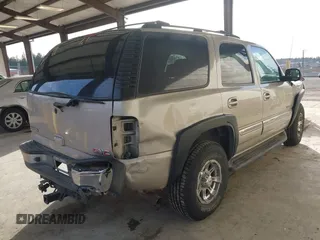 2005 GMC Yukon SLT with VIN 1GKEK13Z95R105420, listed as a IAAI auction lot 41680727 with 230,705 mi miles. Bid and sale history available at carsss.com. Image 4.