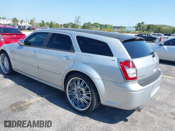 2006 Dodge Magnum R/T z VIN 2D4GV57256H374048, wystawiony jako IAAI lot #42142711 z przebiegiem 173 817 mil mil oraz . Historia ofert i sprzedaży dostępna na DreamBid. Obrazek 3.