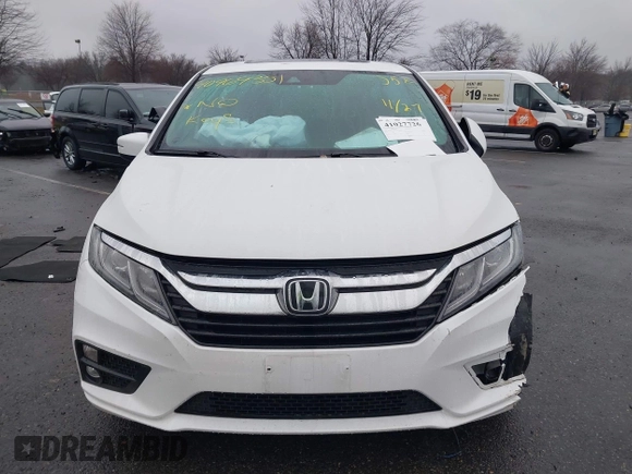 2020 Honda Odyssey EX-L with VIN 5FNRL6H78LB031411, listed as a IAAI auction lot 41027726 with 55,586 mi miles. Bid and sale history available at carsss.com. Image 12.