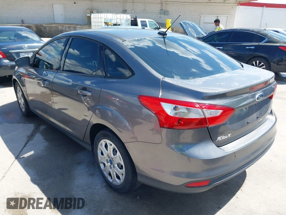 2012 Ford Focus SE with VIN 1FAHP3F28CL211898, listed as a IAAI auction lot 42466544 with 142,933 mi miles and . Bid and sale history available at DreamBid. Image 3.