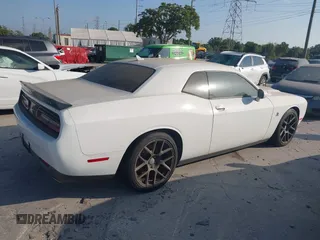 2016 Dodge Challenger R/T Scat Pack z VIN 2C3CDZFJ5GH289781, wystawiony jako IAAI lot #42098014 z przebiegiem Nie podano mil oraz . Historia ofert i sprzedaży dostępna na DreamBid. Obrazek 12.