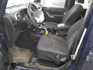 2013 Jeep Wrangler Unlimited Rubicon with VIN 1C4BJWFG5DL572795, listed as a Copart auction lot 62132425 with 149,695 mi miles and Salvage title. Bid and sale history available at DreamBid. Image 7.