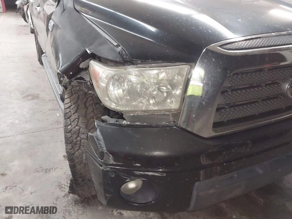 2007 Toyota Tundra LTD with VIN 5TBDV58147S490830, listed as a IAAI auction lot 41823276 with 294,520 mi miles. Bid and sale history available at carsss.com. Image 6.