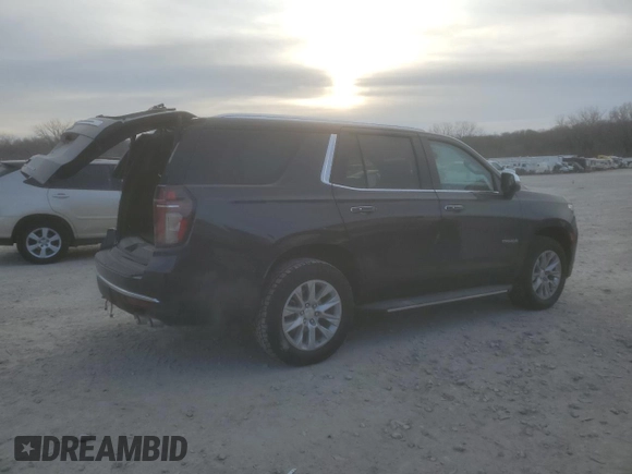 2023 Chevrolet Tahoe Premier with VIN 1GNSCSKD4PR563710, listed as a Copart auction lot 84965394 with 17,528 mi miles and Salvage title. Bid and sale history available at DreamBid. Image 3.
