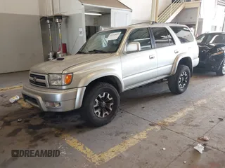 2000 Toyota 4Runner SR5 z VIN JT3HN86R6Y0294870, wystawiony jako IAAI lot #42131835 z przebiegiem 292 259 mil mil oraz . Historia ofert i sprzedaży dostępna na DreamBid. Obrazek 2.