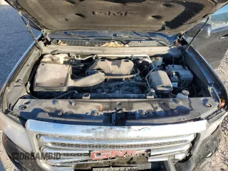 2015 GMC Canyon 4WD SLE with VIN 1GTH6BE37F1133213, listed as a Copart auction lot 82404014 with 142,149 mi miles and Salvage Title. Bid and sale history available at carsss.com. Image 11.
