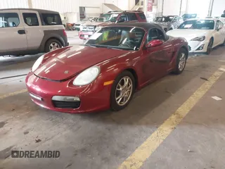 2006 Porsche Boxster z VIN WP0CA29806S710303, wystawiony jako IAAI lot #42276368 z przebiegiem 73 796 mil mil oraz . Historia ofert i sprzedaży dostępna na DreamBid. Obrazek 2.