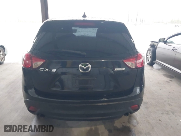 2016 Mazda CX-5 Touring with VIN JM3KE2CY2G0808424, listed as a IAAI auction lot 41880494 with 149,005 mi miles. Bid and sale history available at carsss.com. Image 16.