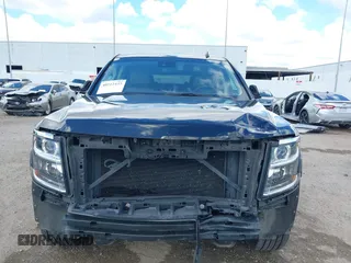 2015 Chevrolet Tahoe LT with VIN 1GNSCBKCXFR214072, listed as a IAAI auction lot 40512435 with 98,955 mi miles and . Bid and sale history available at DreamBid. Image 6.