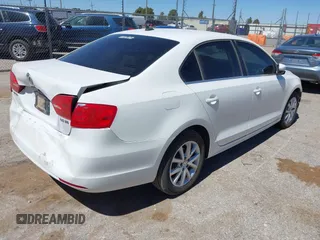 2013 Volkswagen Jetta SE z VIN 3VWDX7AJ4DM424276, wystawiony jako IAAI lot #41878223 z przebiegiem 152 789 mil mil oraz . Historia ofert i sprzedaży dostępna na DreamBid. Obrazek 4.