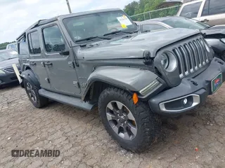 2018 Jeep Wrangler Unlimited Sahara z VIN 1C4HJXEG8JW229720, wystawiony jako IAAI lot #42126736 z przebiegiem 129 783 mil mil oraz . Historia ofert i sprzedaży dostępna na DreamBid. Obrazek 1.