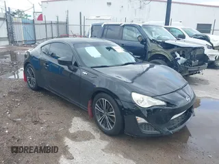 2013 Scion FR-S z VIN JF1ZNAA17D2730896, wystawiony jako IAAI lot #41967157 z przebiegiem 143 681 mil mil oraz . Historia ofert i sprzedaży dostępna na DreamBid. Obrazek 1.