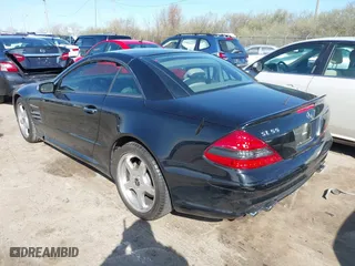 2005 Mercedes-Benz SL-Class 5.5L AMG with VIN WDBSK74F35F103586, listed as a IAAI auction lot 41958469 with 1 mi miles. Bid and sale history available at carsss.com. Image 3.