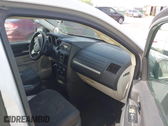 2008 Dodge Grand Caravan SE with VIN 1D8HN44H68B100343, listed as a IAAI auction lot 42126581 with 228,669 mi miles and . Bid and sale history available at DreamBid. Image 5.