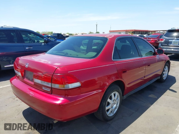 2002 Honda Accord SE z VIN 1HGCG56742A087457, wystawiony jako IAAI lot #42397581 z przebiegiem 187 534 mil mil oraz . Historia ofert i sprzedaży dostępna na DreamBid. Obrazek 4.