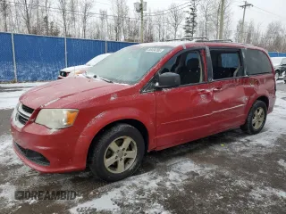 2012 Dodge Grand Caravan SE with VIN 2C4RDGBG2CR356488, listed as a Copart auction lot 88434785 with 295,959 mi miles and Salvage Title. Bid and sale history available at DreamBid. Image 1.