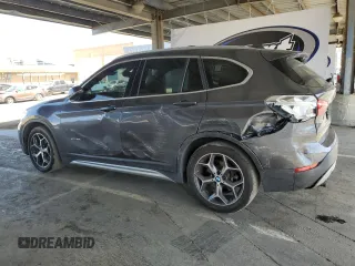 2016 BMW X1 xDrive28i with VIN WBXHT3Z38G4A49061, listed as a Copart auction lot 54010455 with 120,875 mi miles and Salvage Title. Bid and sale history available at DreamBid. Image 2.