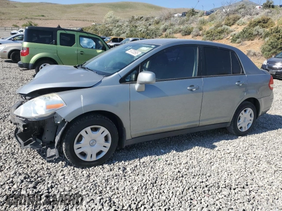2010 Nissan Versa S with VIN 3N1BC1AP8AL457552, listed as a Copart auction lot 59703695 with 149,160 mi miles and Salvage title. Bid and sale history available at DreamBid. Image 1.