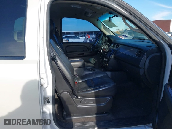 2012 Chevrolet Tahoe Commercial with VIN 1GNLC2E0XCR185593, listed as a IAAI auction lot 41217784 with 150,419 mi miles and . Bid and sale history available at DreamBid. Image 5.