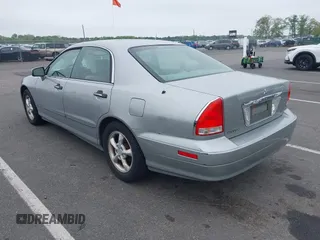 2002 Mitsubishi Diamante LS z VIN 6MMAP57P82T020388, wystawiony jako IAAI lot #42185015 z przebiegiem 121 463 mil mil oraz . Historia ofert i sprzedaży dostępna na DreamBid. Obrazek 3.
