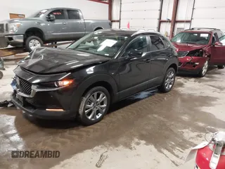 2022 Mazda CX-30 2.5 S Select Package with VIN 3MVDMBBL8NM430516, listed as a IAAI auction lot 41676856 with 36,450 mi miles. Bid and sale history available at carsss.com. Image 2.