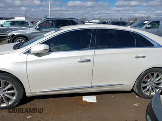 2014 Cadillac XTS Premium with VIN 2G61P5S38E9124277, listed as a IAAI auction lot 41744734 with 136,223 mi miles. Bid and sale history available at carsss.com. Image 14.