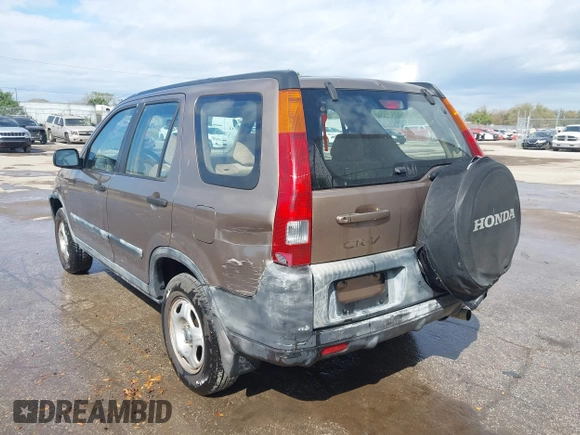 2003 Honda CR-V LX with VIN JHLRD68513C009276, listed as a IAAI auction lot 41563452 with 240,519 mi miles and . Bid and sale history available at DreamBid. Image 6.