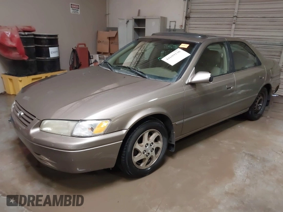 1999 Toyota Camry LE z VIN JT2BF28K7X0167855, wystawiony jako IAAI lot #41609230 z przebiegiem 242 398 mil mil oraz . Historia ofert i sprzedaży dostępna na DreamBid. Obrazek 17.