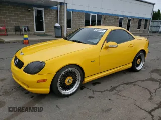 2001 Mercedes-Benz SLK-Class Kompressor with VIN WDBKK49F61F184147, listed as a Copart auction lot 64860084 with 0 mi miles and Salvage Title. Bid and sale history available at carsss.com. Image 1.