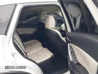 2016 Mazda CX-5 Grand Touring with VIN JM3KE4DY3G0838204, listed as a IAAI auction lot 41961049 with 98,918 mi miles and . Bid and sale history available at carsss.com. Image 8.