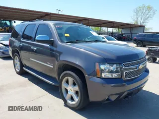 2010 Chevrolet Tahoe LTZ z VIN 1GNUCCE04AR106586, wystawiony jako IAAI lot #41972972 z przebiegiem 283 992 mil mil oraz . Historia ofert i sprzedaży dostępna na DreamBid. Obrazek 1.
