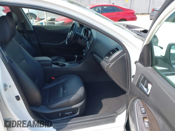 2015 Kia Optima EX with VIN 5XXGN4A77FG497218, listed as a IAAI auction lot 42464839 with 128,355 mi miles and . Bid and sale history available at DreamBid. Image 5.