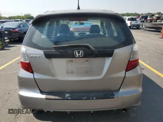 2010 Honda Fit Sport with VIN JHMGE8H60AS025797, listed as a Copart auction lot 65152145 with 240,719 mi miles and Clean title. Bid and sale history available at DreamBid. Image 6.