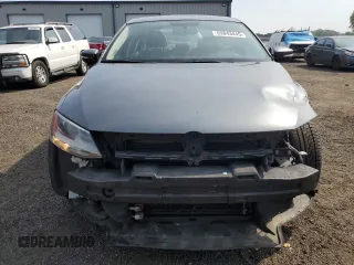 2014 Volkswagen Jetta SE z VIN 3VWD17AJ8EM405443, wystawiony jako Copart lot #59843445 z przebiegiem 156 331 mil mil oraz Szkoda całkowita • Salvage title. Historia ofert i sprzedaży dostępna na DreamBid. Obrazek 5.