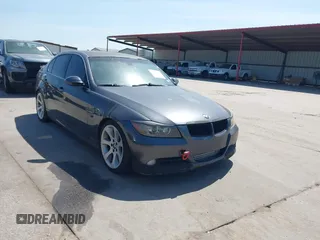 2008 BMW 3 Series 335i with VIN WBAVB775X8NH78654, listed as a IAAI auction lot 41885433 with 127,451 mi miles. Bid and sale history available at carsss.com. Image 1.