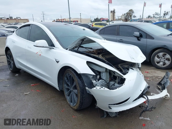 2018 Tesla Model 3 Long Range Battery with VIN 5YJ3E1EA1JF038751, listed as a IAAI auction lot 40553966 with 95,753 mi miles and . Bid and sale history available at DreamBid. Image 1.