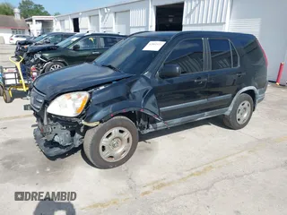 2005 Honda CR-V LX with VIN JHLRD78535C031868, listed as a IAAI auction lot 42002372 with 201,258 mi miles. Bid and sale history available at carsss.com. Image 18.